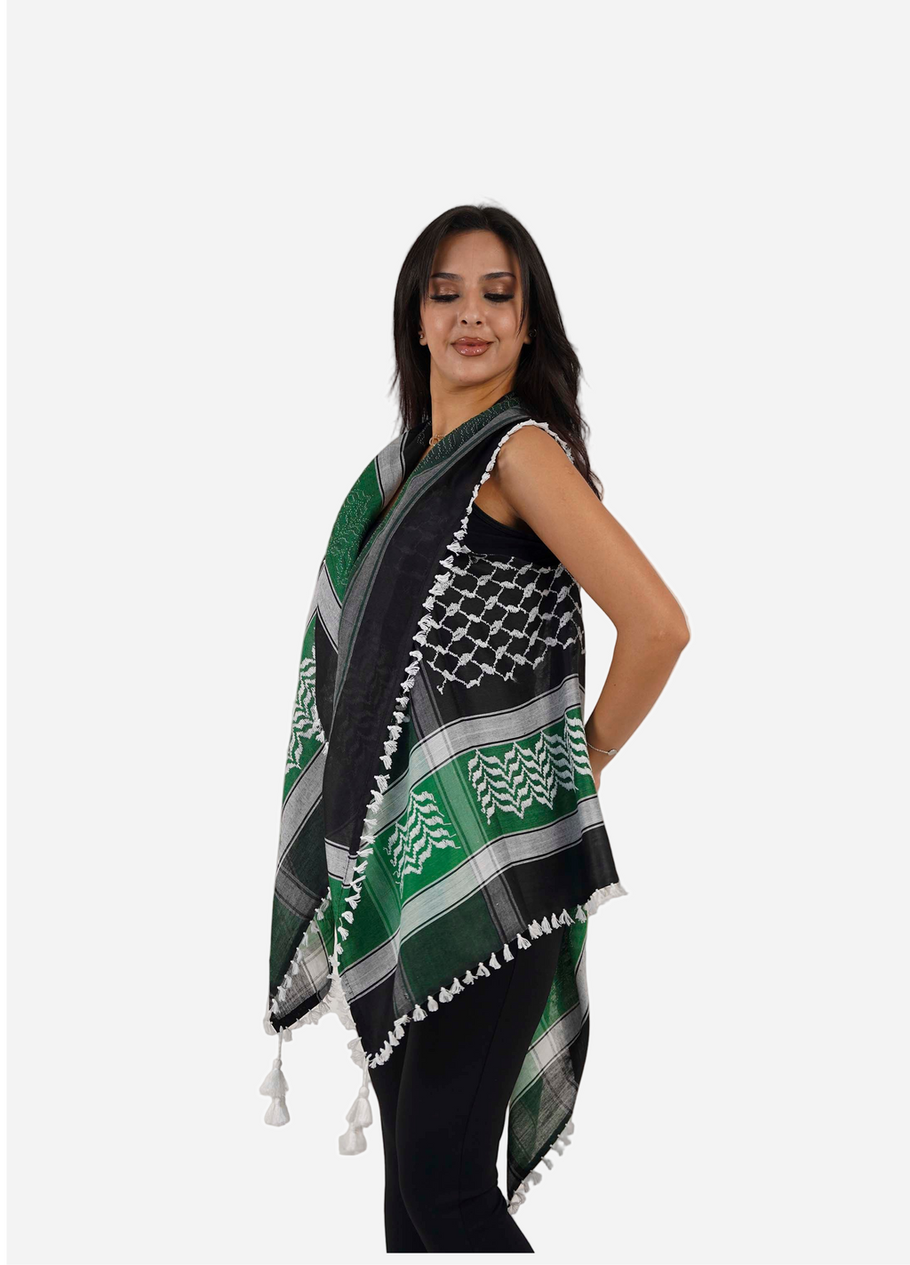 Woman wearing a green and black checkered scarf with white patterns on a white background