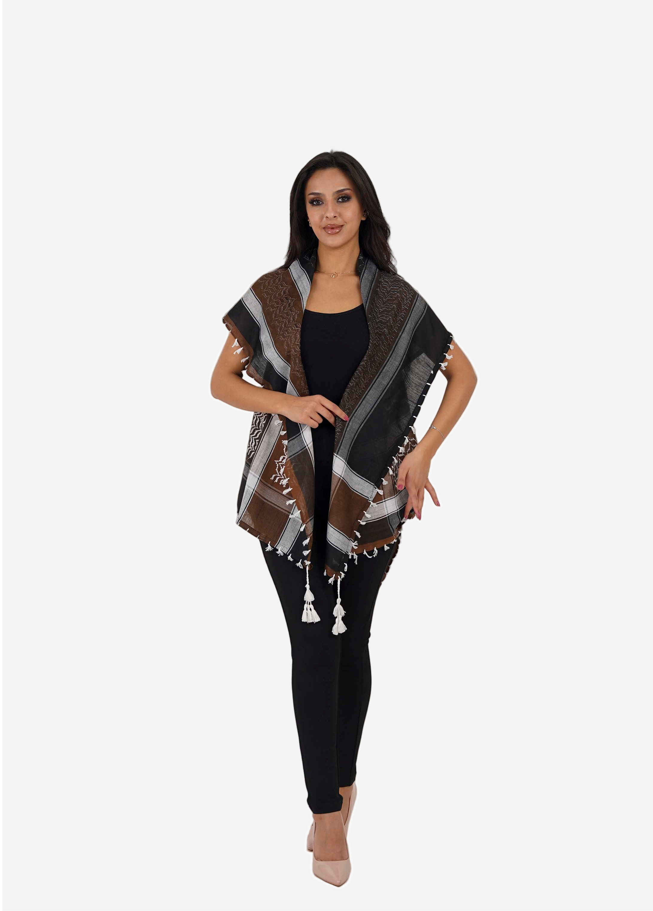 Woman wearing a patterned shawl on a white background