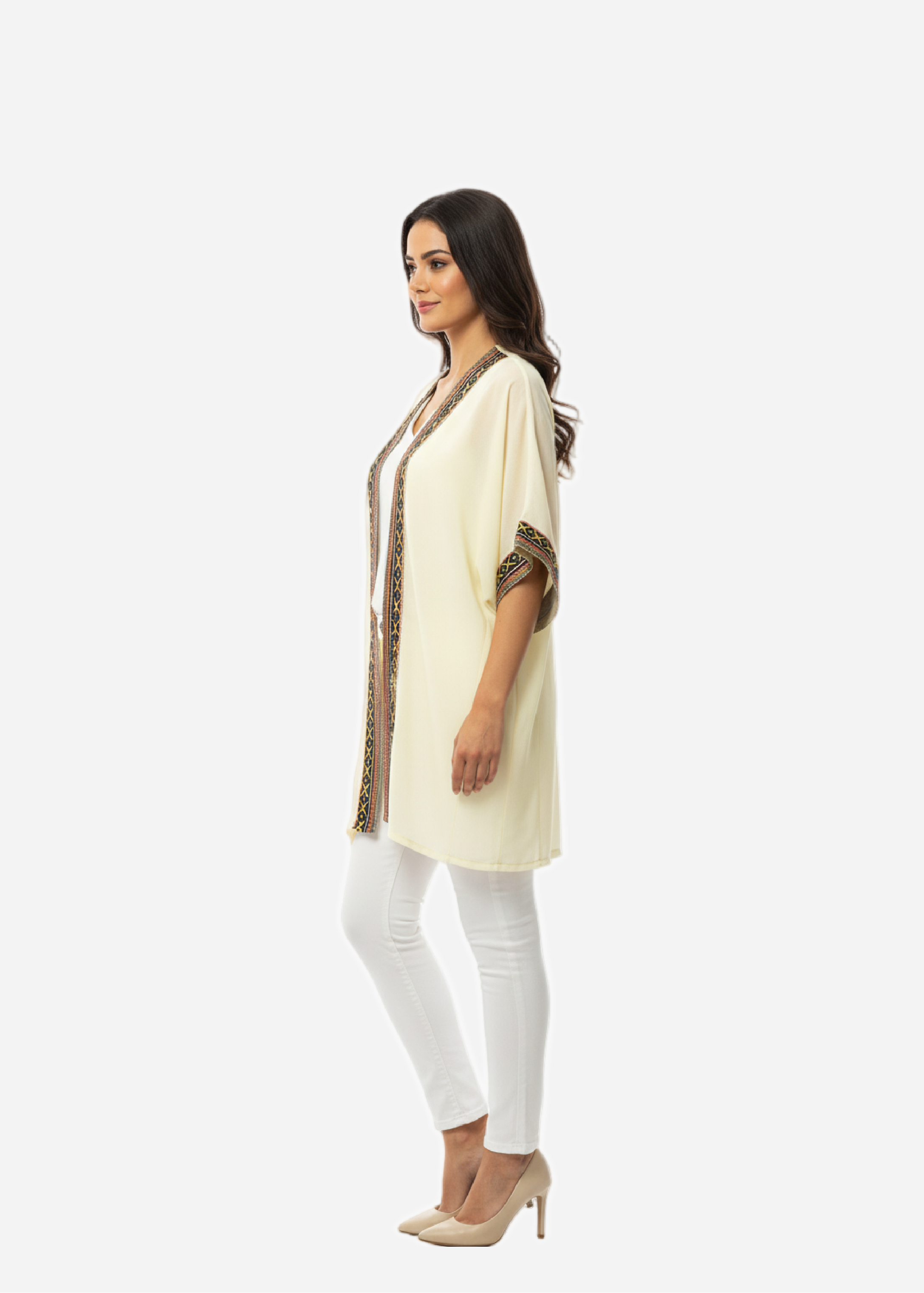 Woman wearing a cream kurta with intricate embroidery on a white background